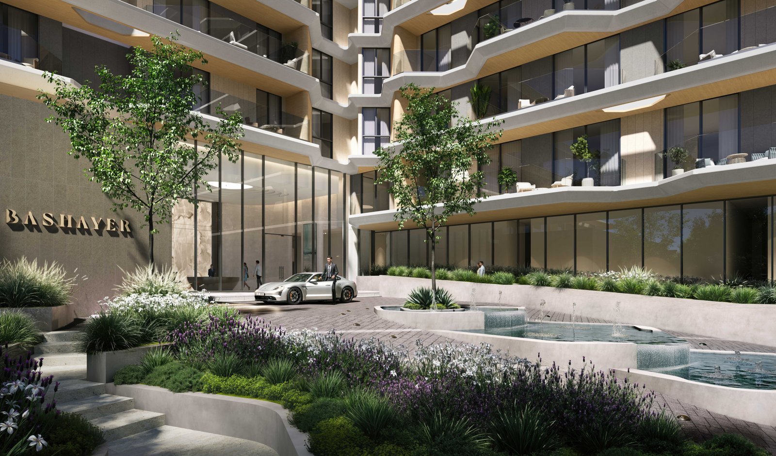 A picturesque waterfront promenade at Bashayer Residences, lined with manicured parks, scenic boardwalks, and lively leisure spaces across Hudayriyat Islan
